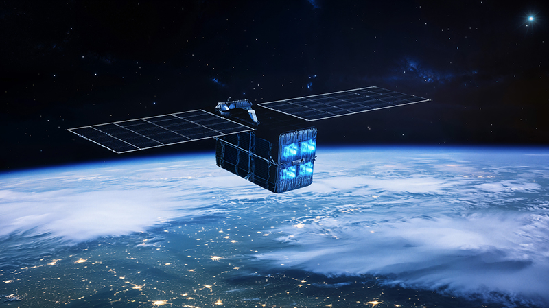 Indra's space satellite drifts over the globe, the illuminated networks of cities visible below.